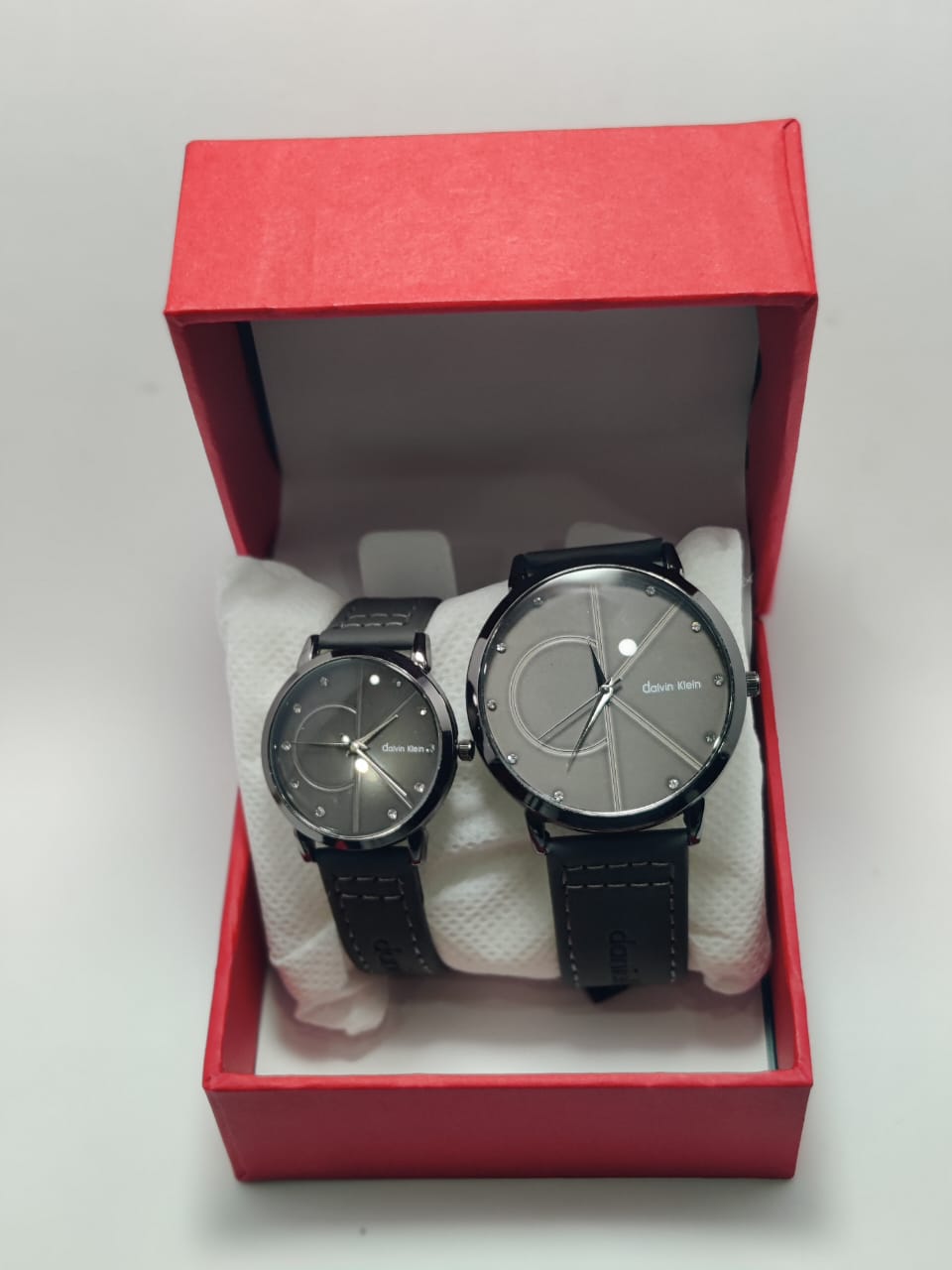 CK Couple Watches featuring matching designs for him and her, symbolizing love and timeless elegance