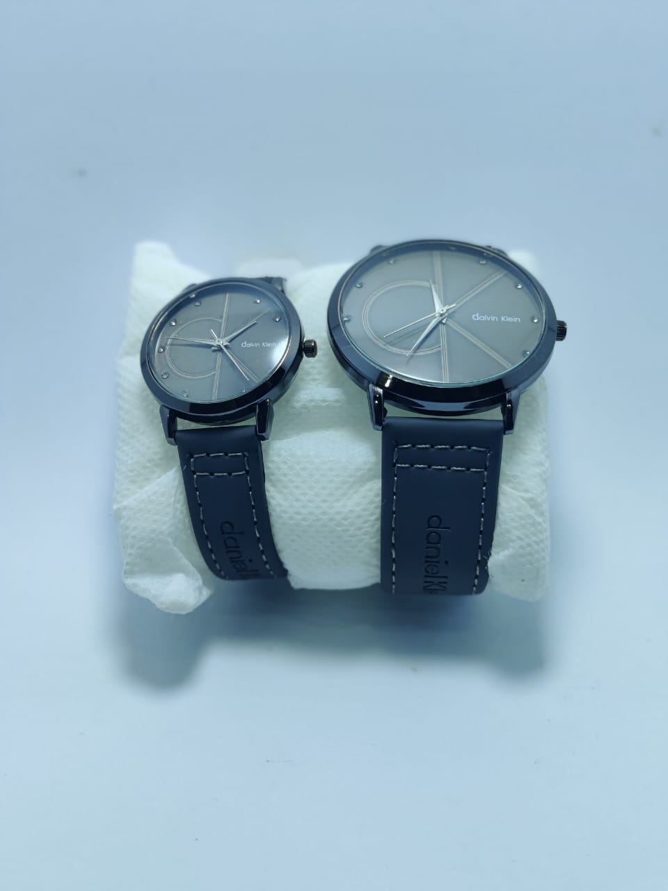 CK Couple Watches featuring matching designs for him and her, symbolizing love and timeless elegance